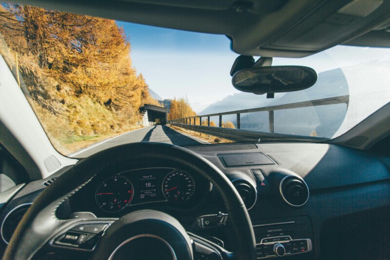 Vehicle approaching tunnel in the road