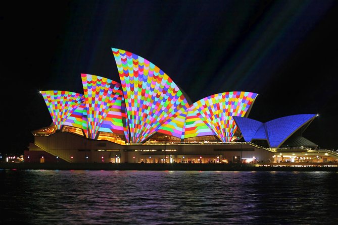 Colorful lights projected at the Sydney Opera House