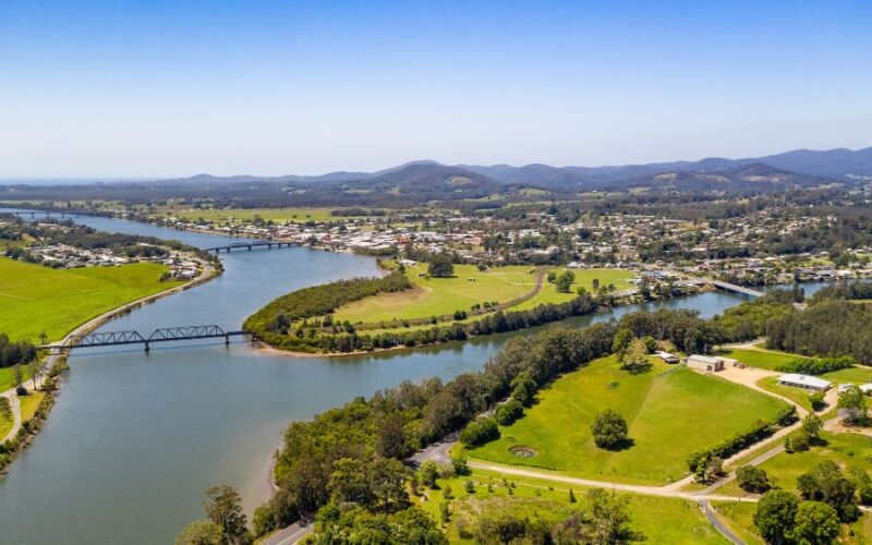 What town is halfway between Brisbane and Sydney?