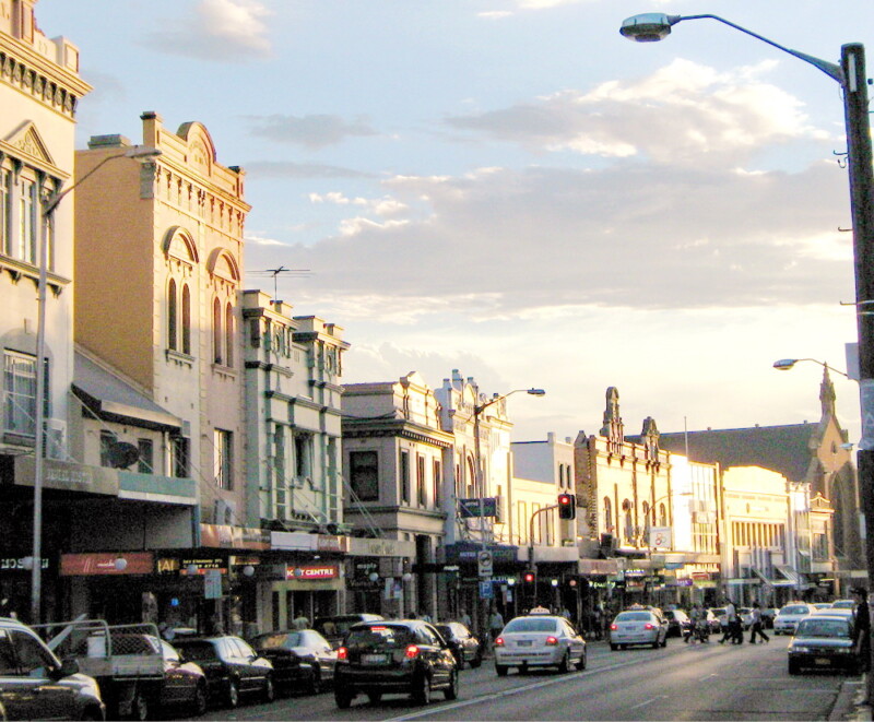 Cars and buildings in King Street, Newtown