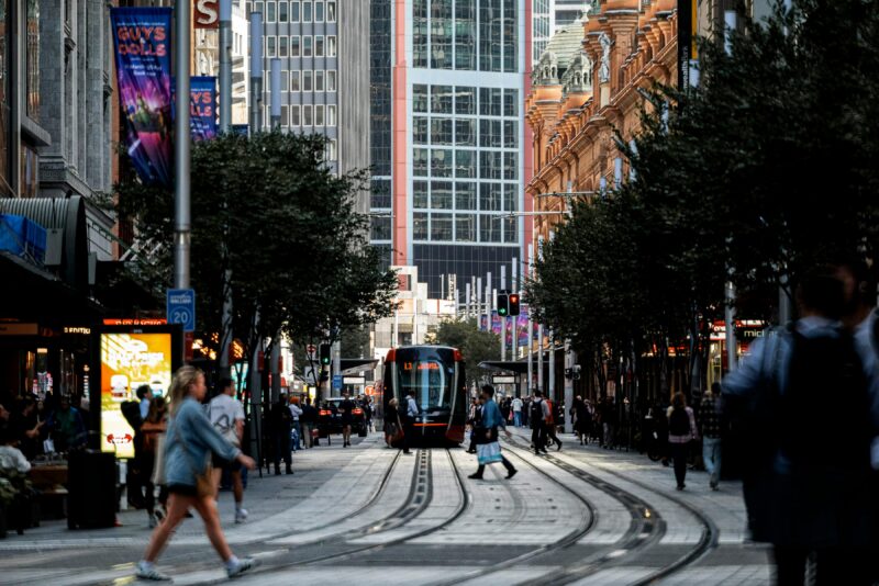 Vibrant Street Scene with Light Rail in Sydney CBD