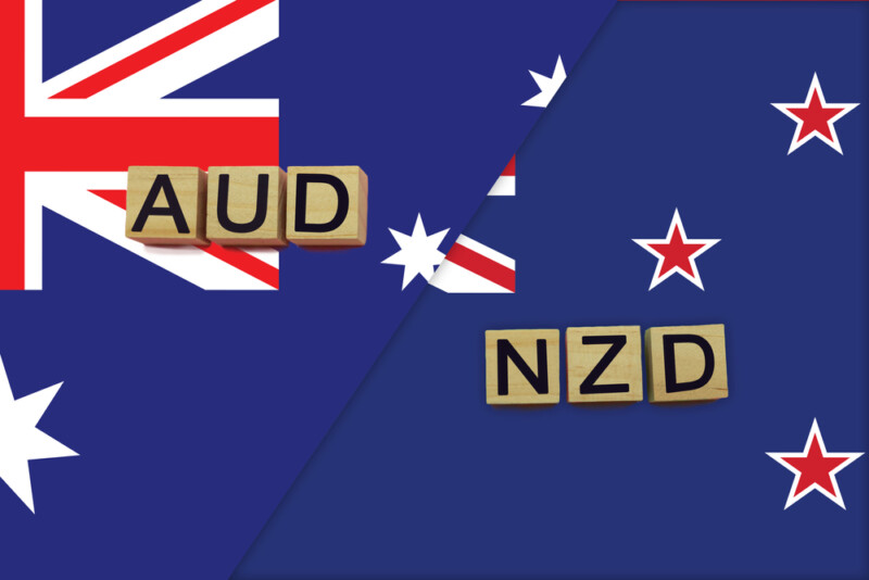 Australia and New Zealand currencies codes on national flags background