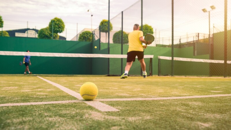 Man paddel player playing a match in the open