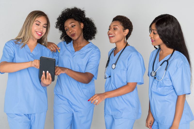 Group of happy female nurses