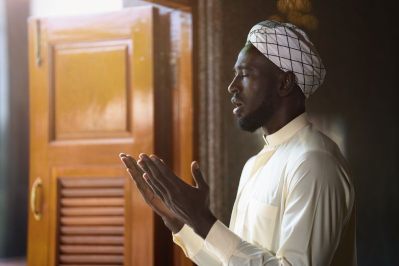 Muslim man praying to allah