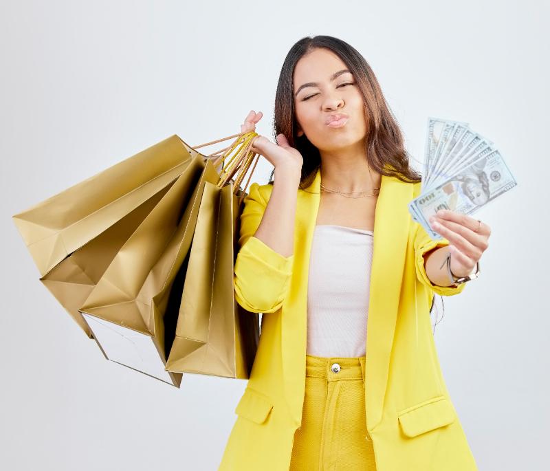 Woman with bags and cash