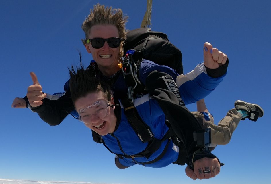 Happy tourist skydiving