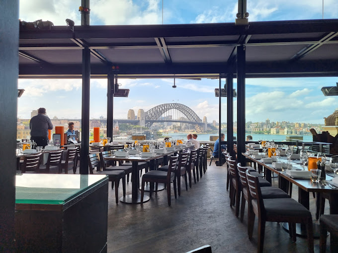 Empty seats at the Cafe Sydney with the view of the harbour