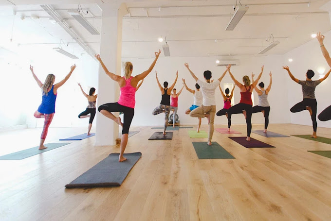 Yoga session inside the InYoga