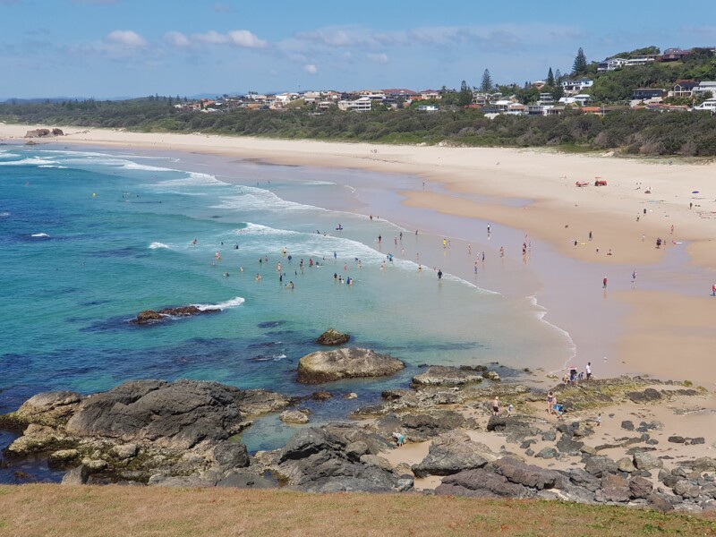 Beachgoers at Lighthouse beach in Port Macquarie