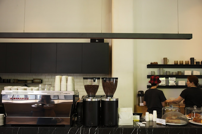 Busy baristas at Skittle Lane cafe in Sydney