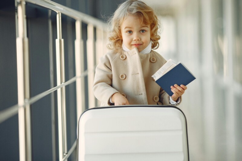 Little girl traveling by herself