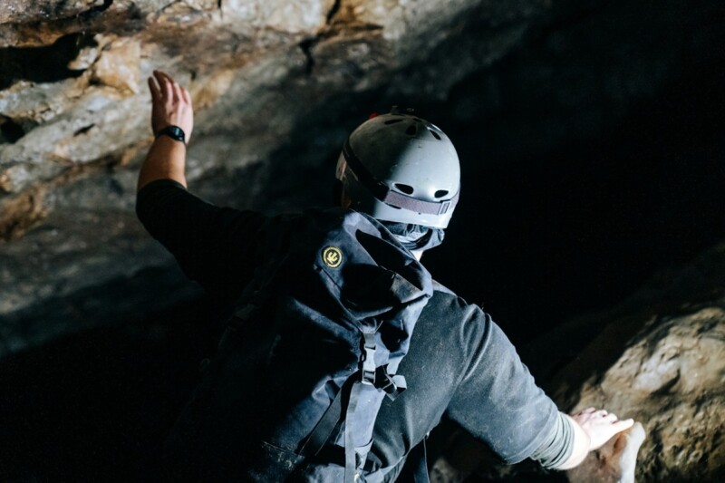 Man wearing appropriate clothing and helmet