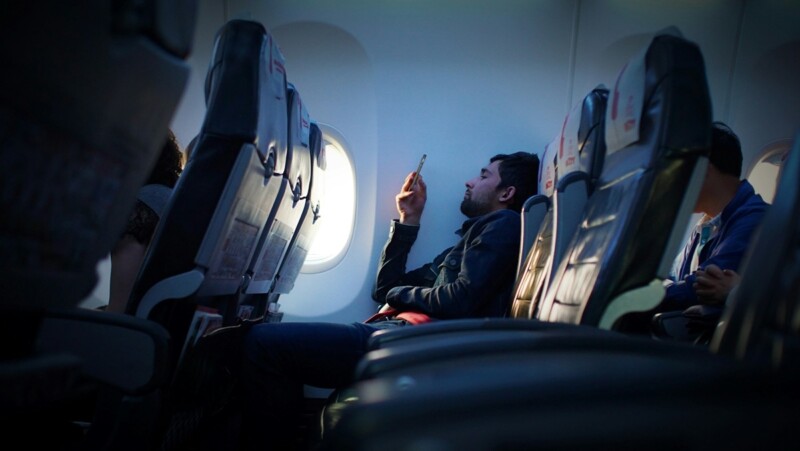 Which mobile provider/network is better in Sydney, Vodafone or Telstra? 3 Traveler Guy On Phone using international roaming